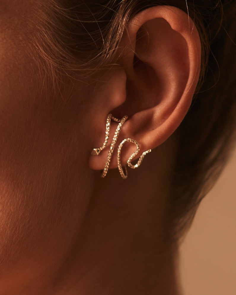 Naja Earrings in Silver, worn, Sarah Vankaster Handmade Jewelry, Serpent Collection