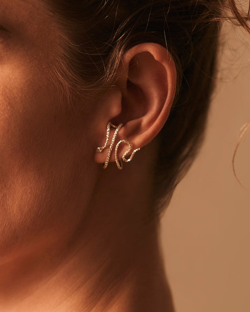 Naja Earrings in Silver, worn, Sarah Vankaster Handmade Jewelry, Serpent Collection
